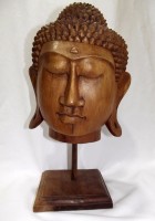 Escultura tallada en madera de Buda